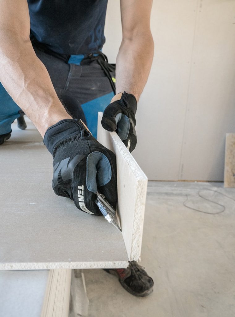 a man working on a piece of wood